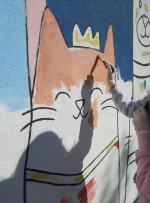 Wspólne malowanie połączyło dzieci, rodziców i artystów