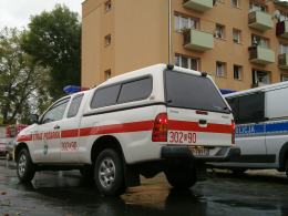 Strażacy uratowali kobietę z pożaru