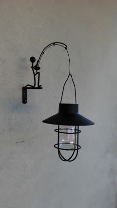Lampa solarna i uchwyt.